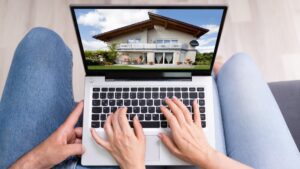 Couple Family Searching Real Estate Online On Laptop