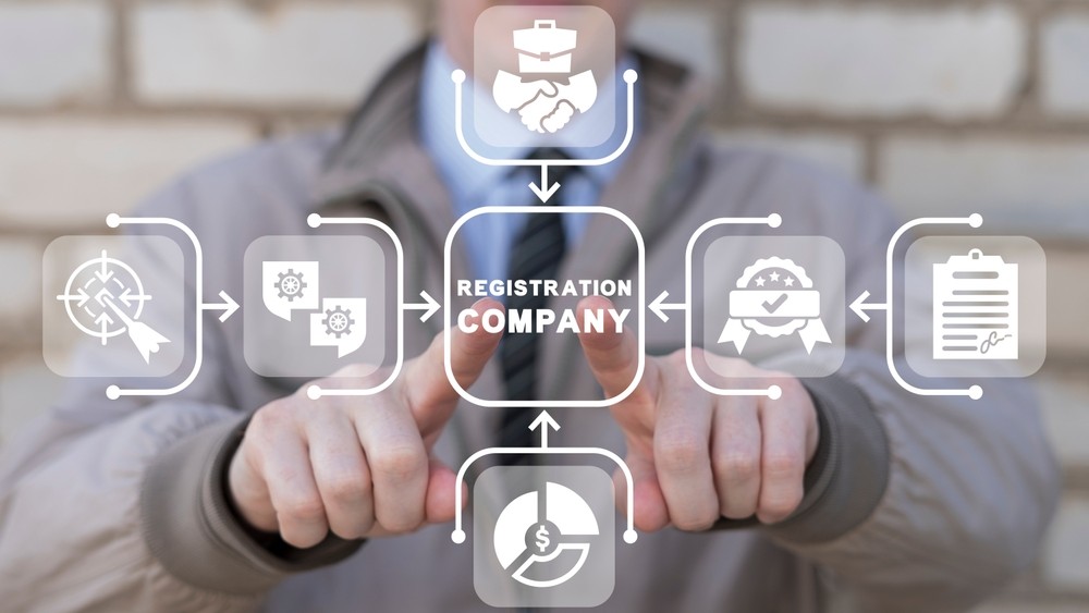 Man using virtual touch screen presses inscription: REGISTRATION COMPANY. New company registration concept. Business start up. Brand and identity building process. Company formation procedure.