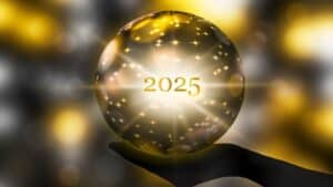 Crystal ball with '2025' symbolising future property investment trends.