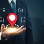 Real estate location concept with GPS pin and house icons, representing property search, map-based home listings, and smart housing navigation.