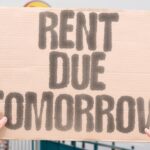 “Rent Due Tomorrow” The calendar nags louder than any alarm ever could. HOUSING. STRESS. DEADLINE. INFLATION. URGENCY. NIGHT.