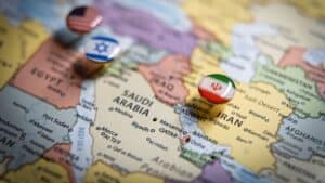 Map of Middle East with pins representing Iran, Israel, and Saudi Arabia.