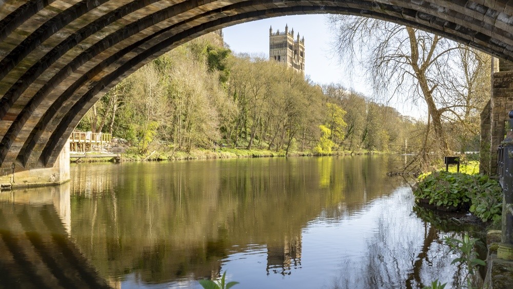 Scenic View of Durham Cathedral and the River Wear, County Durham, England on a sunny Spring Day