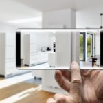 Two hands holding a mobile Smartphone and take a picture in a Modern luxury living room and kitchen